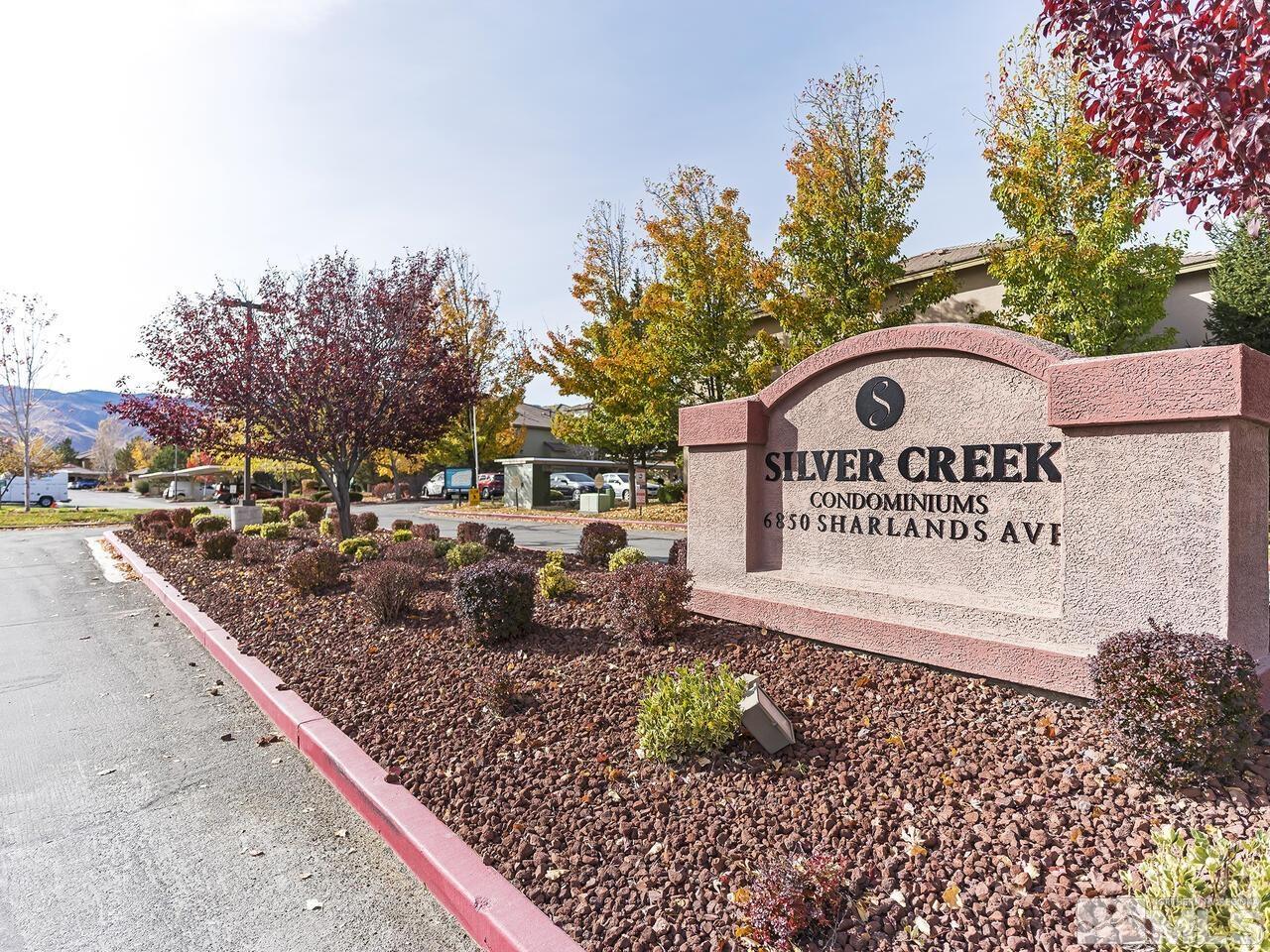 6850 Sharlands Avenue, Unit M1077 Reno, NV 89523 - Photo 20 of 27 a sign on the side of a street