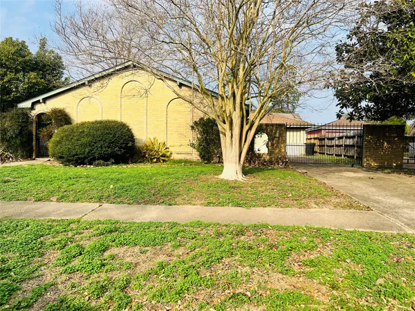 a view of swimming pool with outdoor seating and yard