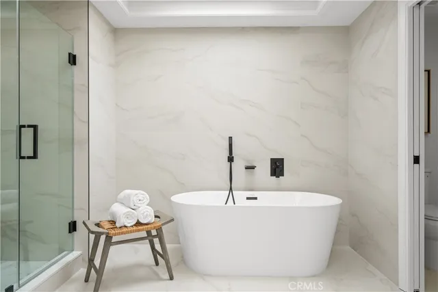 a view of a livingroom with furniture and a table