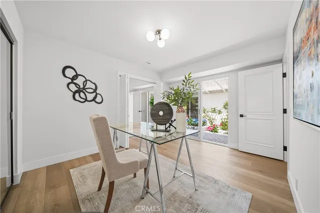 wooden floor with white walls