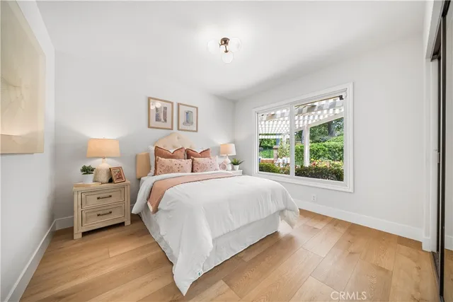 a large kitchen with stainless steel appliances lots of counter space and a sink