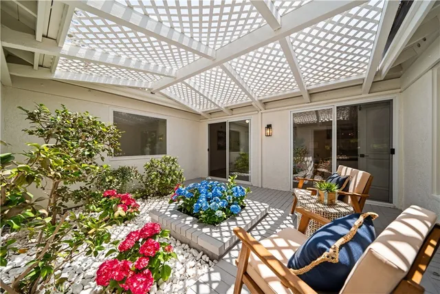 a view of a porch with furniture