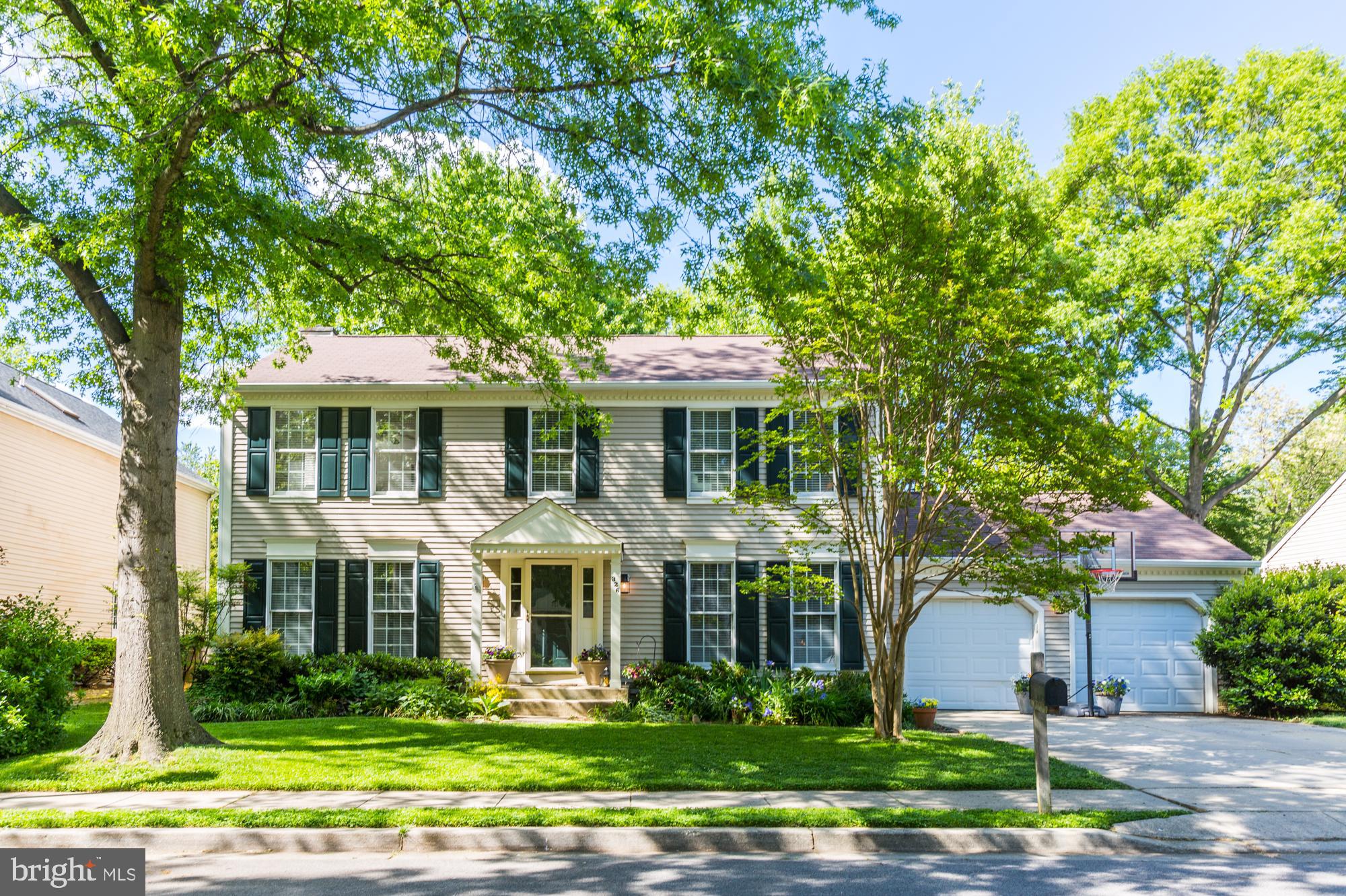 326 Riding Ridge Road Annapolis, MD 21403 - Photo 1 of 63 a front view of a house with a yard