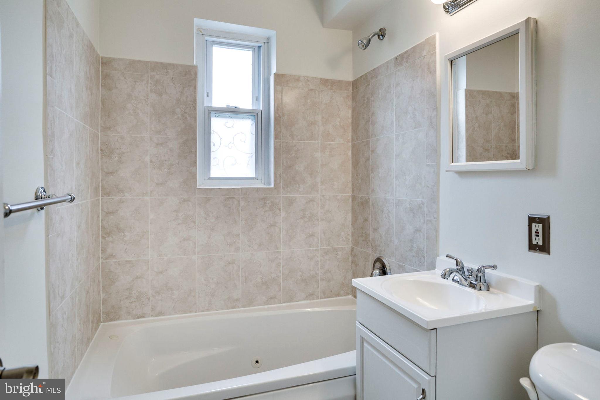 8708 Bradford Road, Unit 202 Silver Spring, MD 20901 - Photo 12 of 28 Bathroom