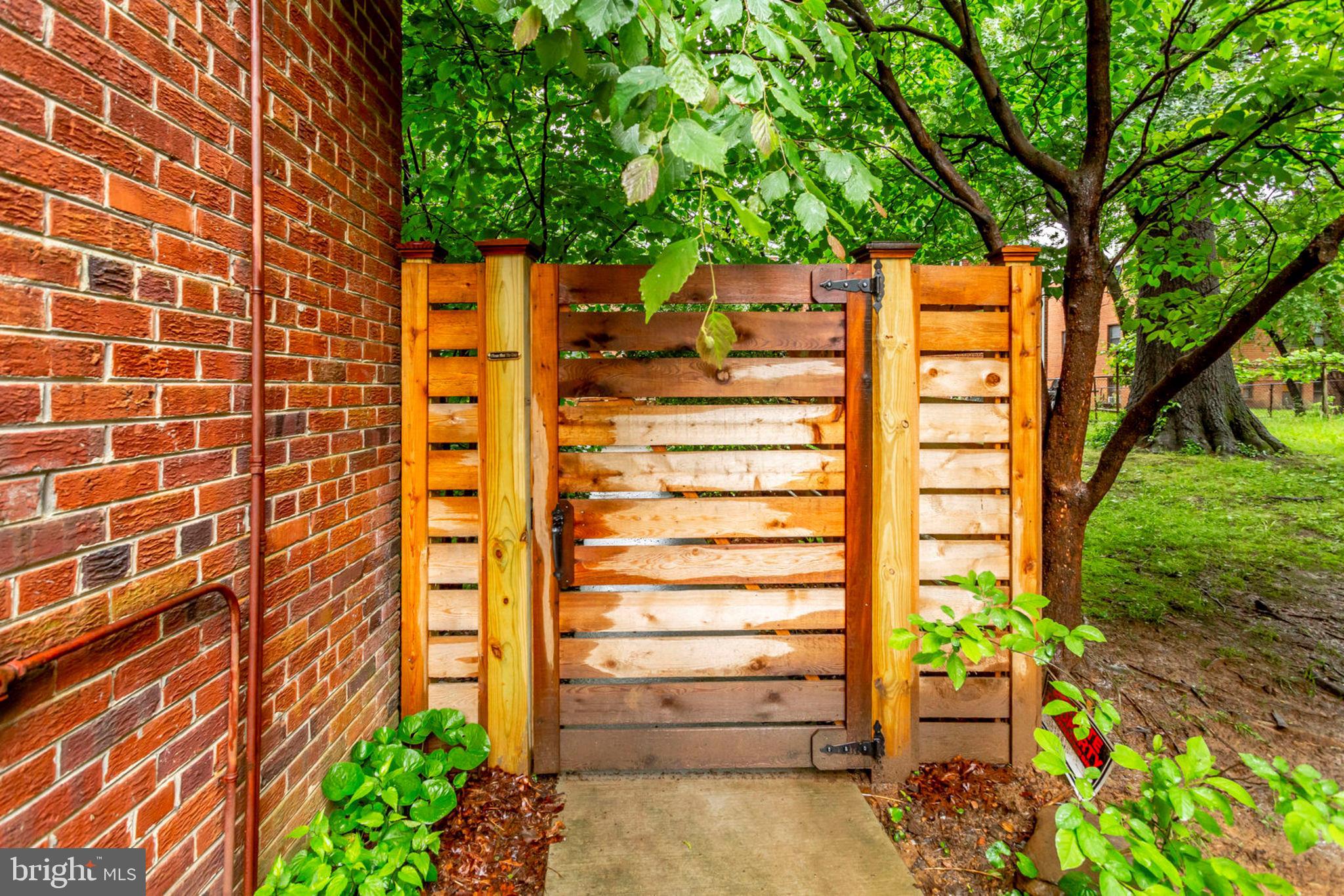 8708 Bradford Road, Unit 202 Silver Spring, MD 20901 - Photo 24 of 28 Entrance to backyard / common area