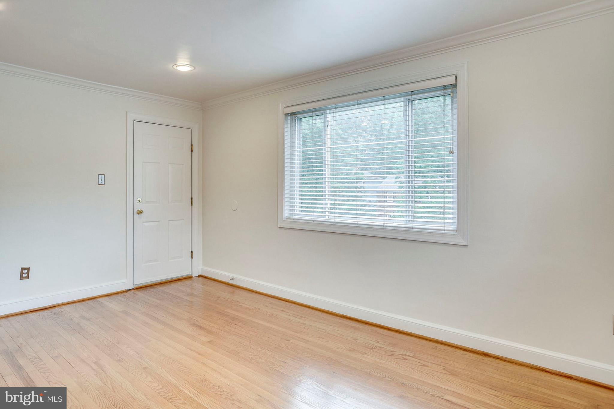 8708 Bradford Road, Unit 202 Silver Spring, MD 20901 - Photo 10 of 28 Living Room / front entrance