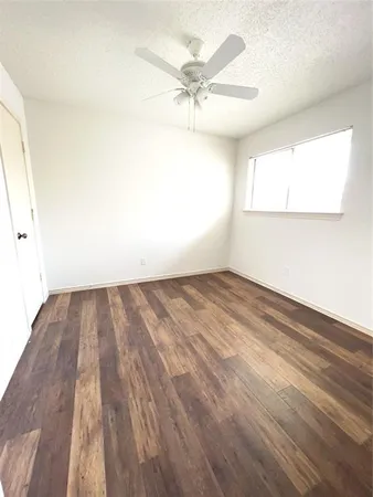 wooden floor in a hall with an entryway