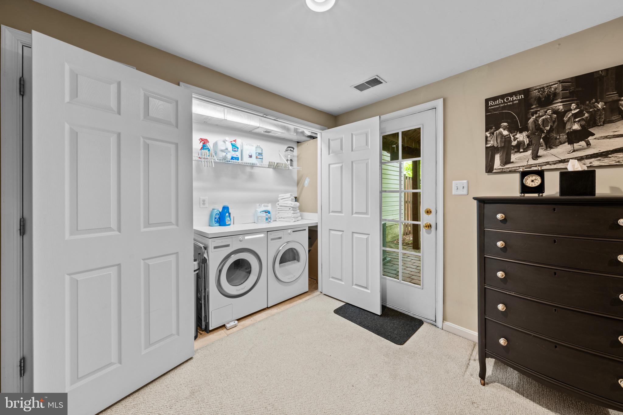 21980 Box Car Square Sterling, VA 20166 - Photo 22 of 36 Asko Washer & Dryer topped with folding counter