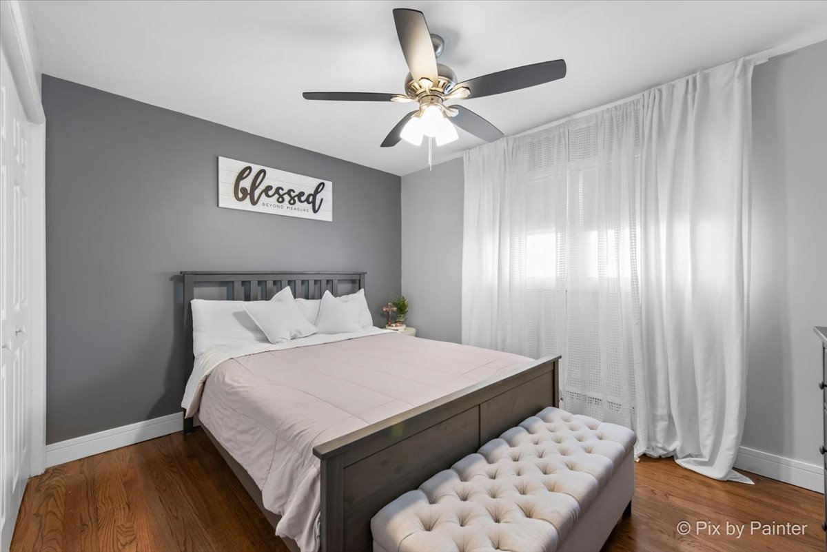 3121 Paris Avenue, Unit 304 River Grove, IL 60171 - Photo 12 of 16 a bedroom with a bed and a window