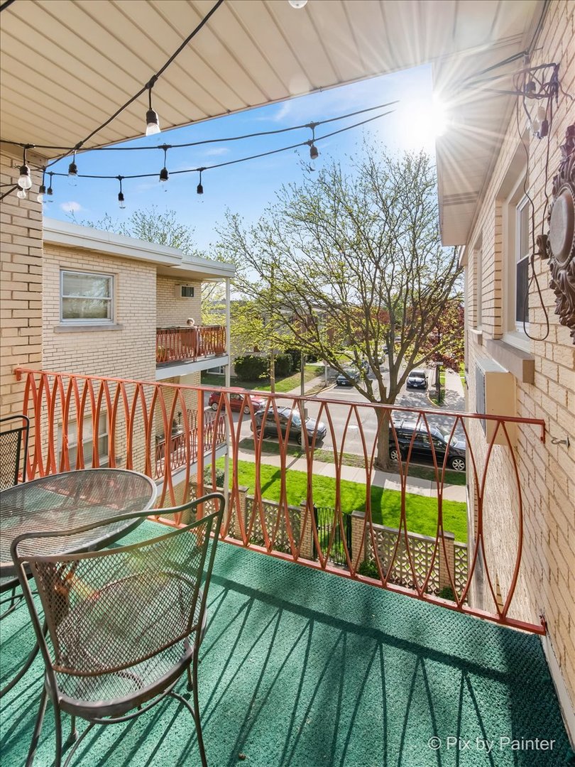 3121 Paris Avenue, Unit 304 River Grove, IL 60171 - Photo 14 of 16 a view of a backyard with a patio and wooden floor