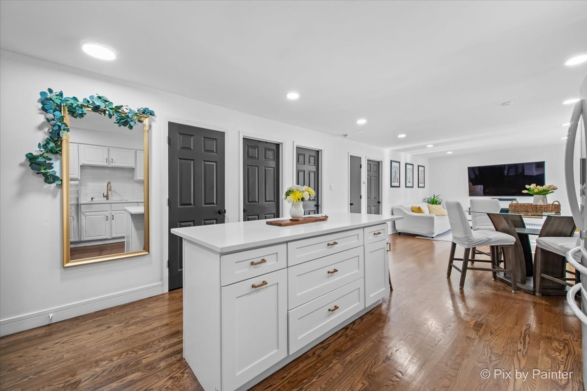 3121 Paris Avenue, Unit 304 River Grove, IL 60171 - Photo 3 of 16 a living room with furniture and a flat screen tv