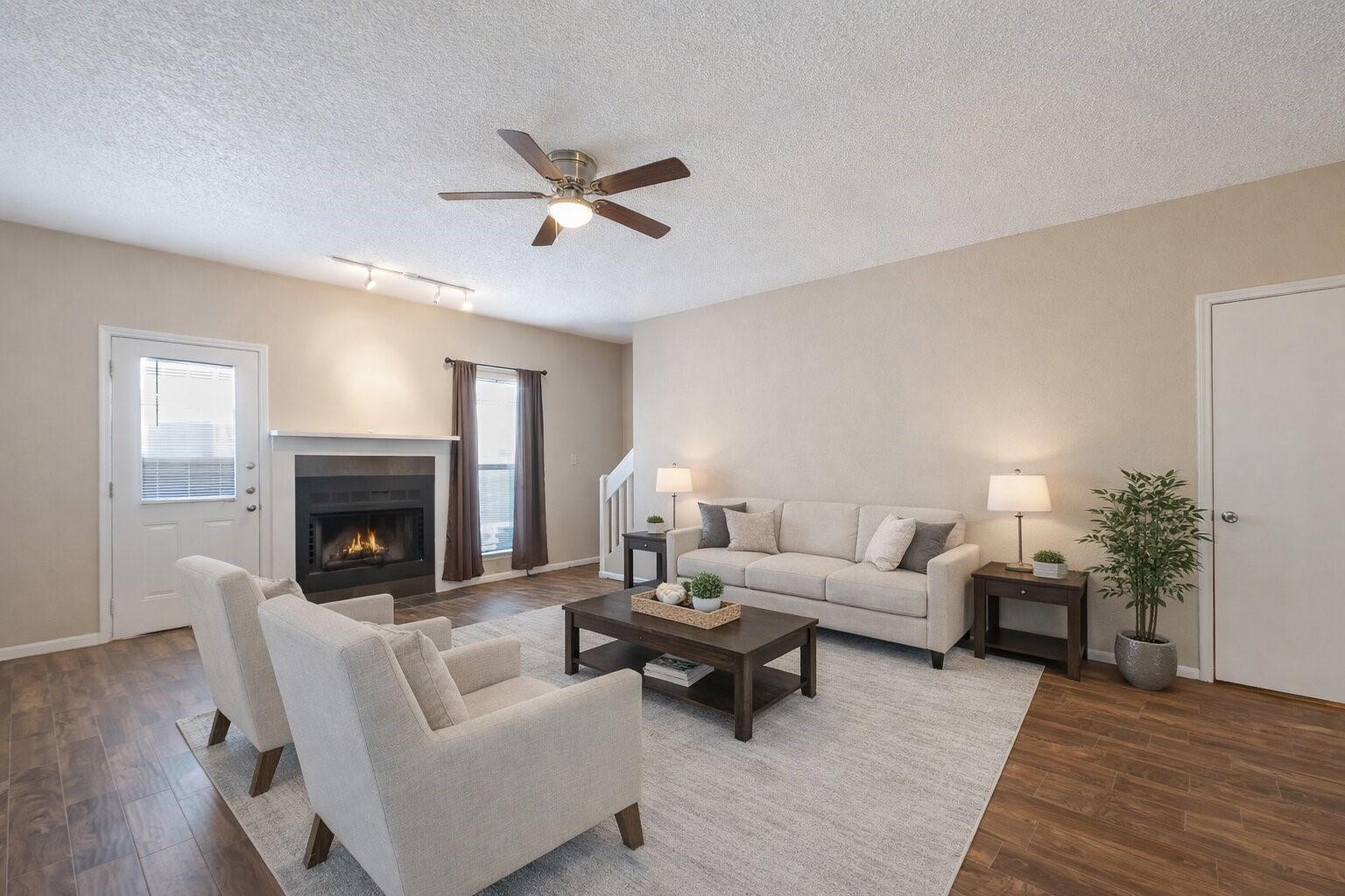 12400 Brookglade Circle, Unit 15 Houston, TX 77099 - Photo 13 of 43 a living room with furniture and a fireplace