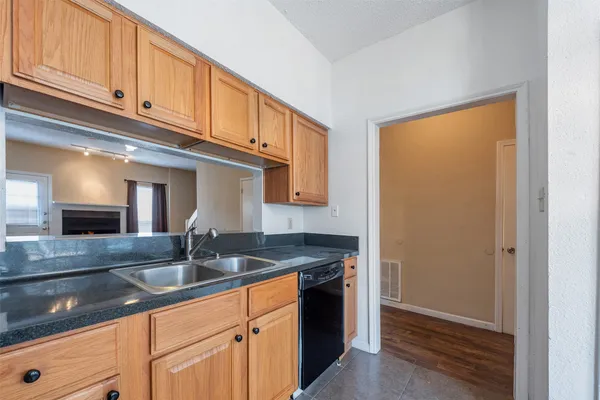 a view of a hallway with staircase