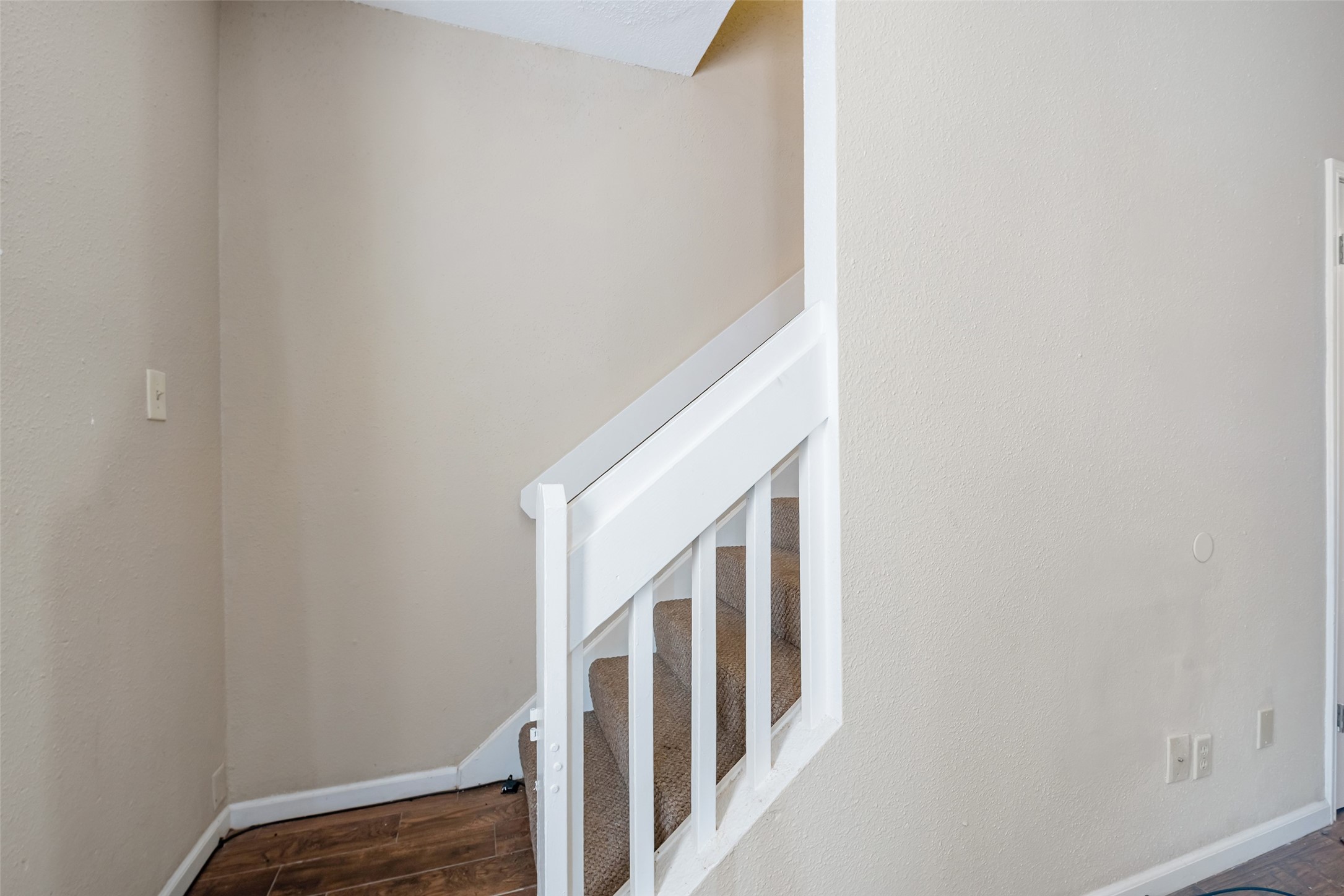 12400 Brookglade Circle, Unit 15 Houston, TX 77099 - Photo 19 of 43 a view of a hallway with staircase
