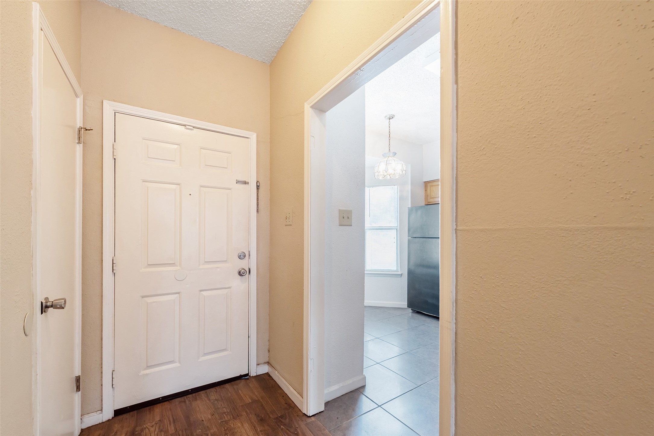 12400 Brookglade Circle, Unit 15 Houston, TX 77099 - Photo 3 of 43 a view of a bathroom from a hallway