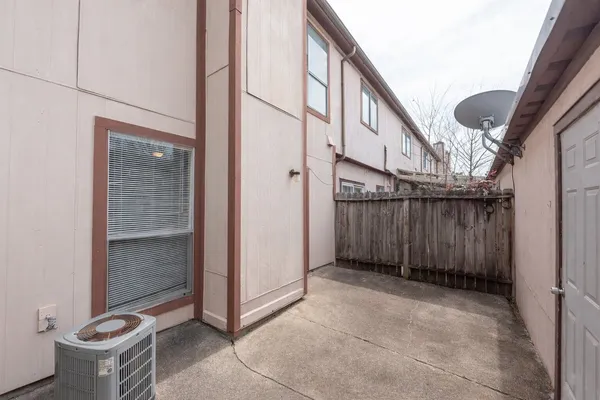 a view of a house with a backyard and a slide