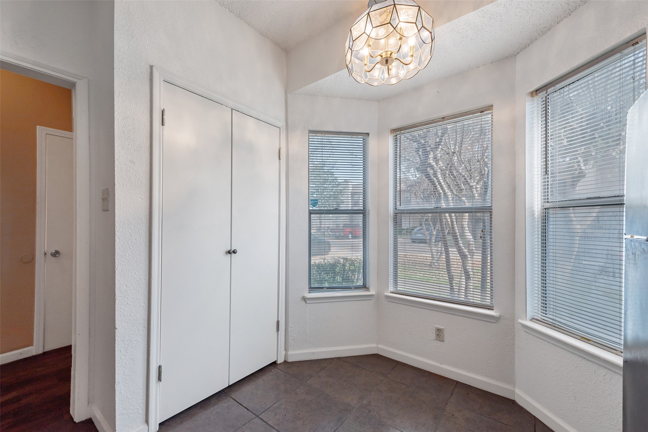 12400 Brookglade Circle, Unit 15 Houston, TX 77099 - Photo 4 of 43 a view of an empty room with a window