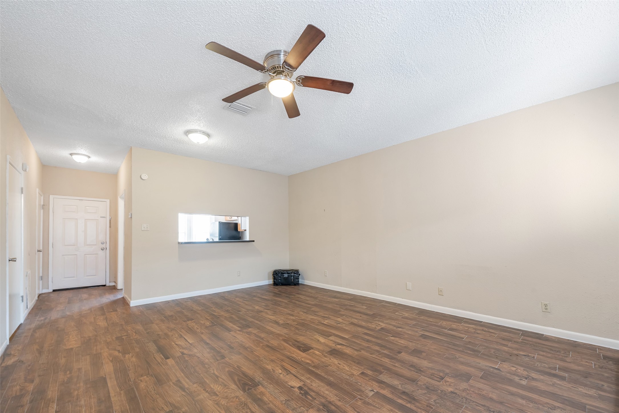 12400 Brookglade Circle, Unit 15 Houston, TX 77099 - Photo 10 of 43 a view of empty room with wooden floor