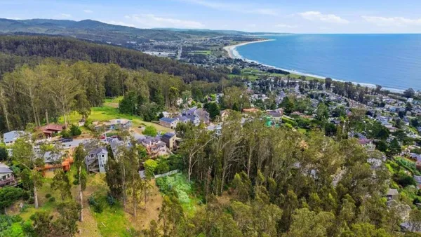 a view of a lot of trees and houses