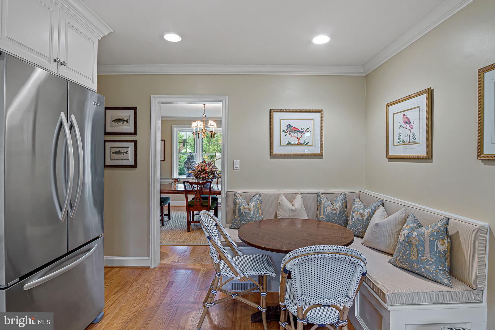 106 Edgewood Road Wilmington, DE 19803 - Photo 13 of 25 a view of a dining room with furniture a rug and wooden floor