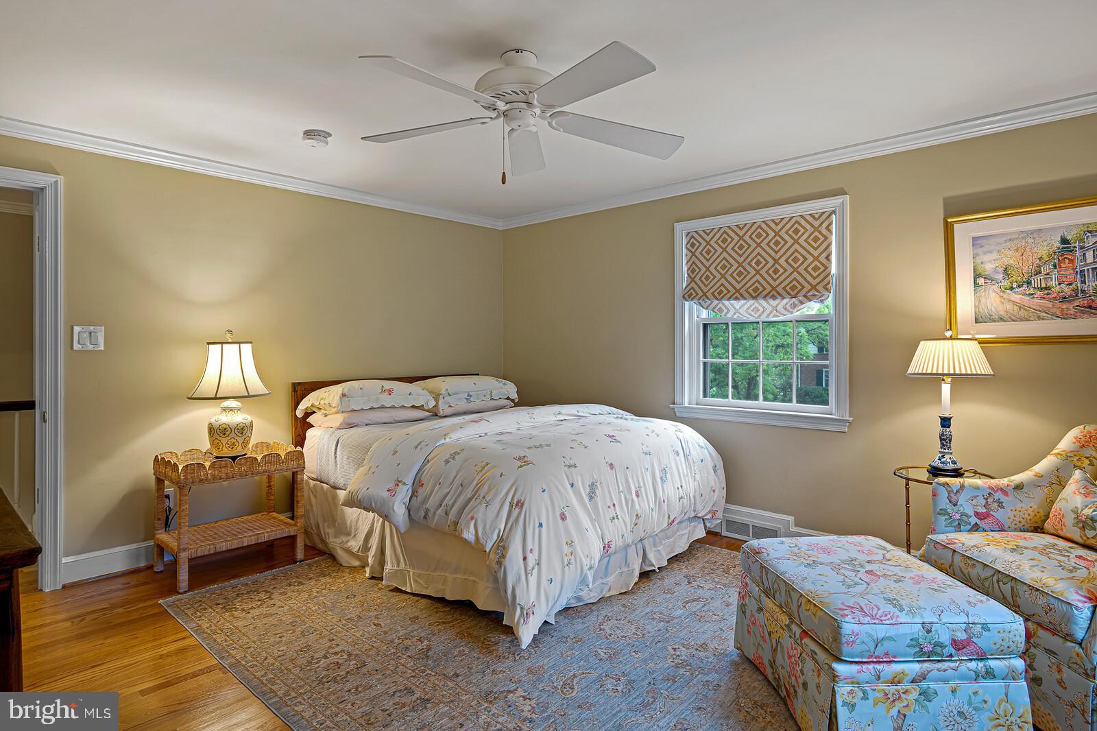 106 Edgewood Road Wilmington, DE 19803 - Photo 20 of 25 a bed room with a bed and a lamp