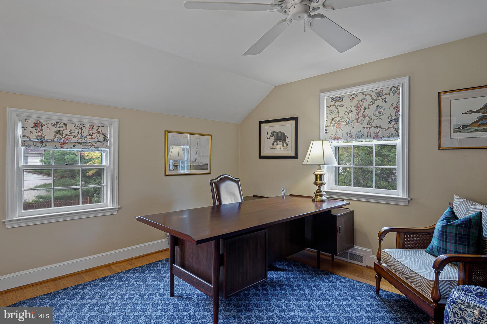 106 Edgewood Road Wilmington, DE 19803 - Photo 21 of 25 a dining room with wooden floor and a chandelier