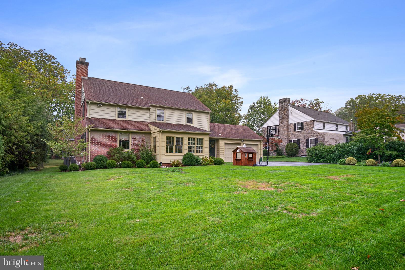 106 Edgewood Road Wilmington, DE 19803 - Photo 23 of 25 a front view of a house with a garden