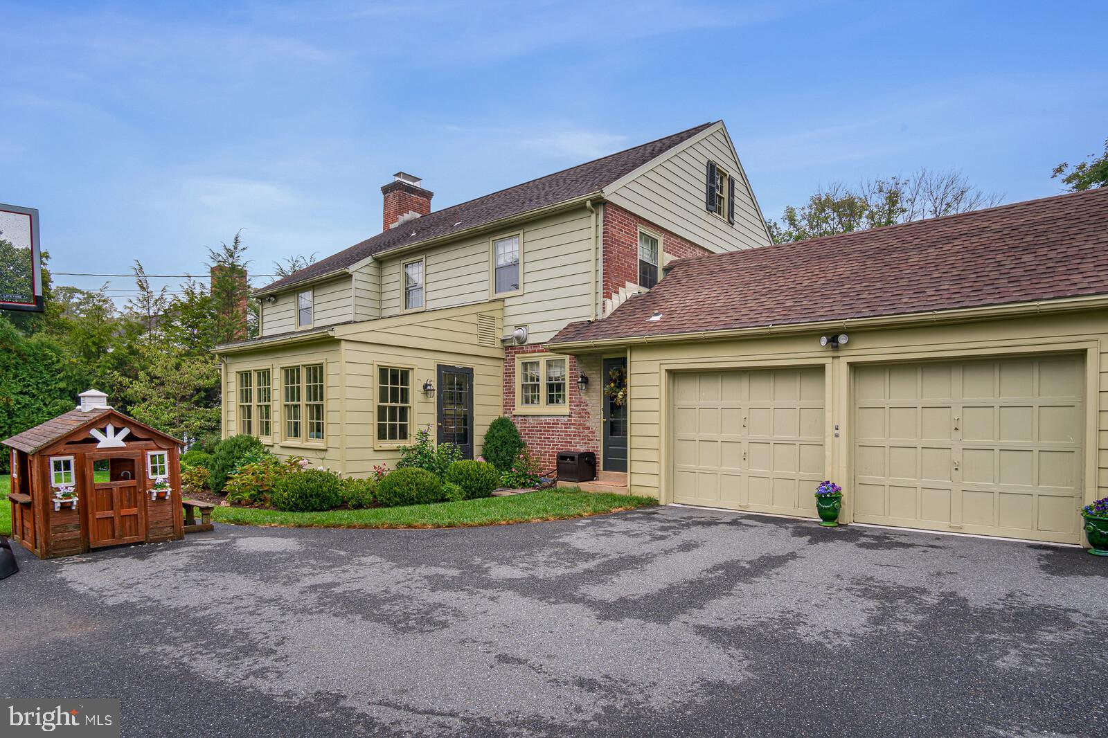 106 Edgewood Road Wilmington, DE 19803 - Photo 25 of 25 a front view of a house with a yard and garage