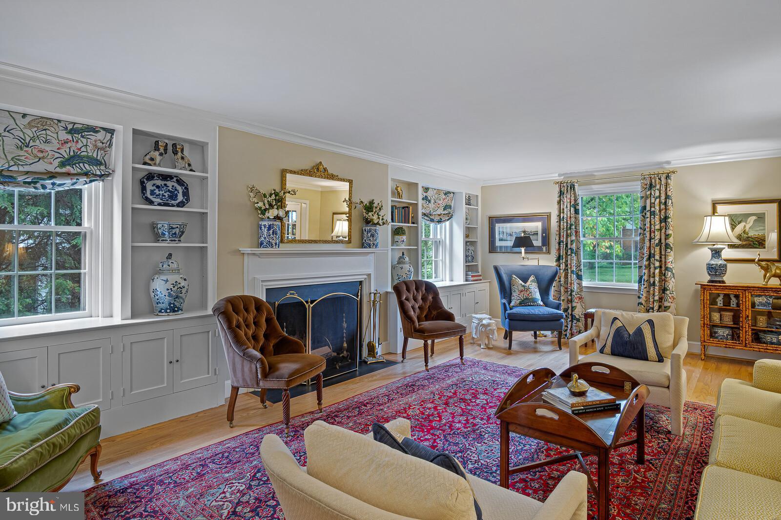 106 Edgewood Road Wilmington, DE 19803 - Photo 7 of 25 a living room with furniture and a fireplace