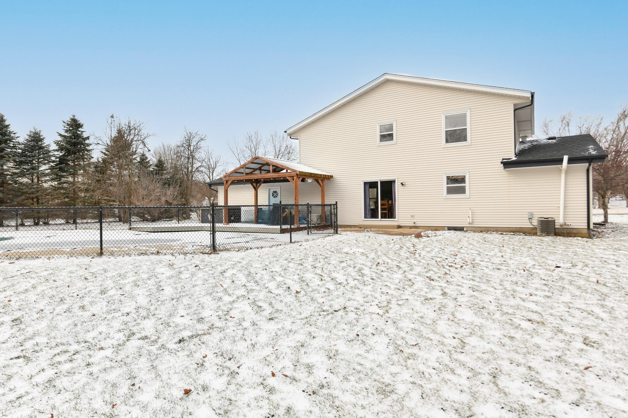 W328S8232 Memory Lane Mukwonago, WI 53149 - Photo 41 of 46 Back of House w/ Pergola