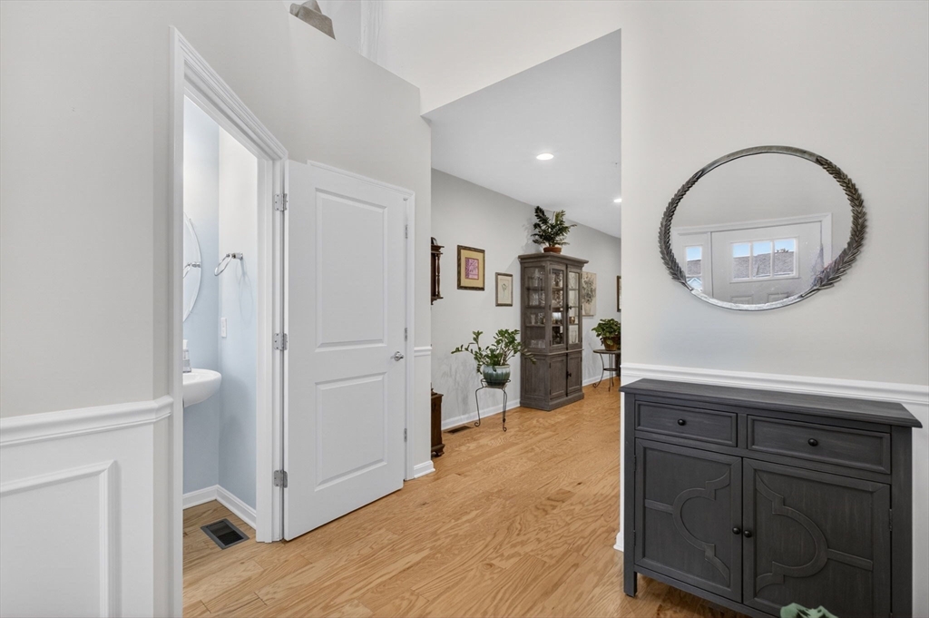 87 Shannon Way, Unit 86 Upton, MA 01568 - Photo 30 of 36 a view of a kitchen from the hallway