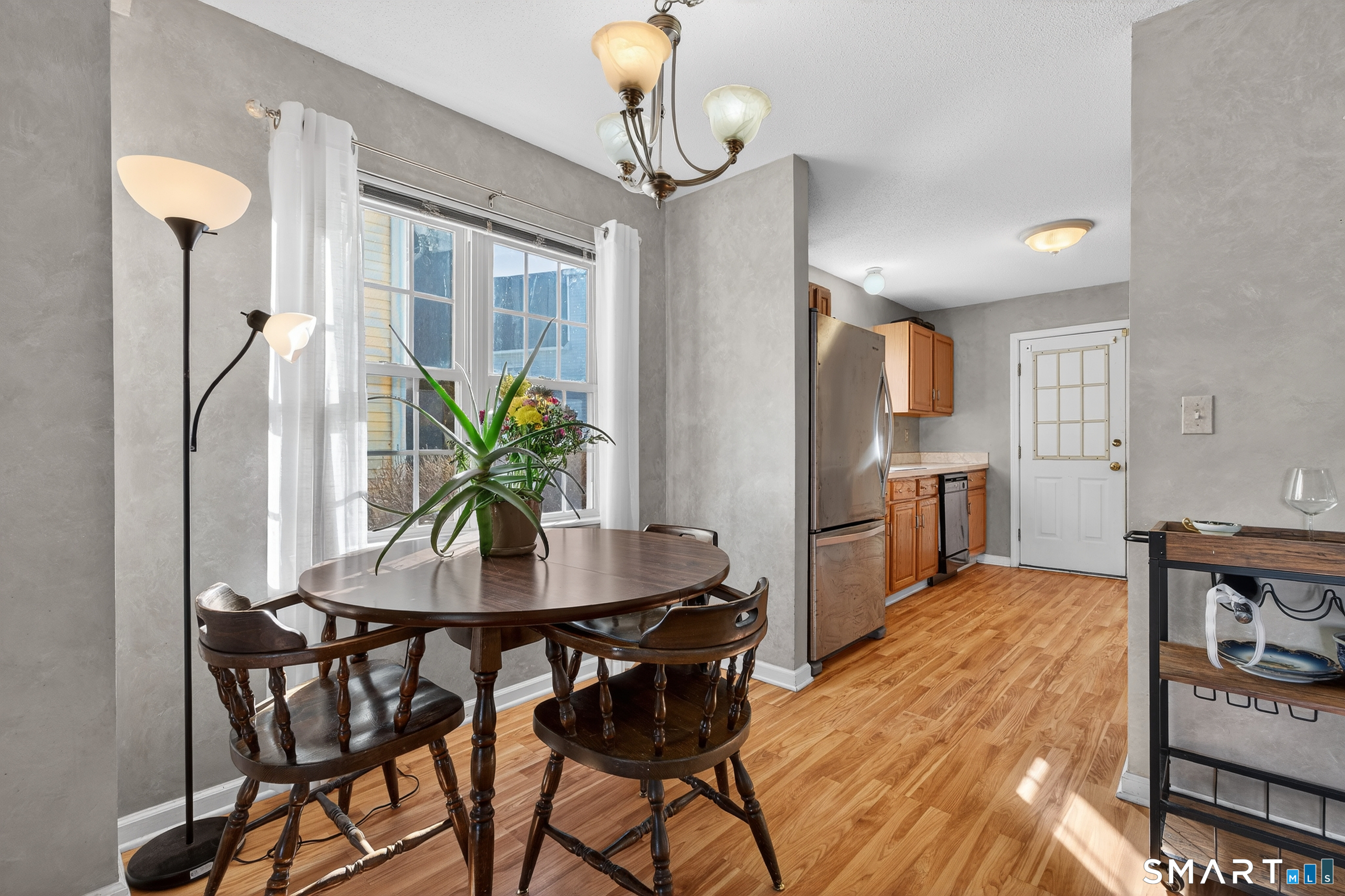 2390 State Street, Unit L17C Hamden, CT 06517 - Photo 10 of 23 a dining room with furniture and window