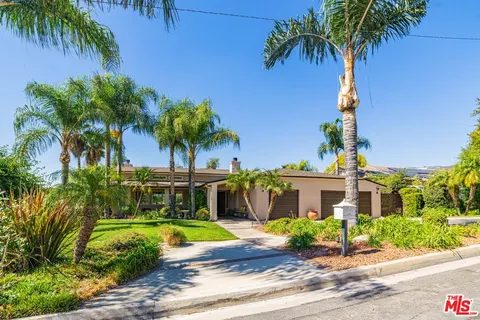 a view of a house with a swimming pool