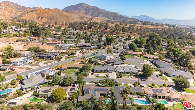 an aerial view of a city with lots of residential buildings