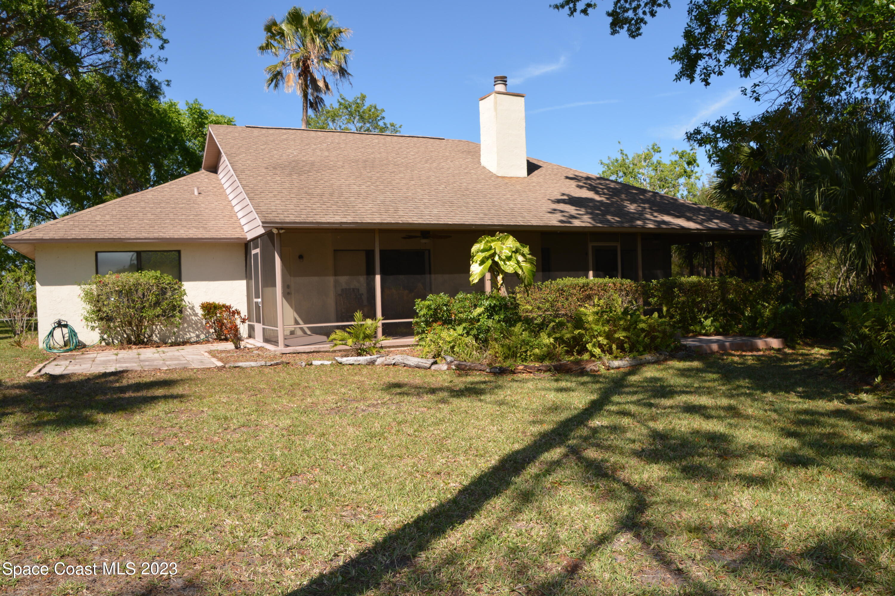 1045 Pine Island Road Merritt Island, FL 32953 - Photo 31 of 42 a view of house with outdoor space