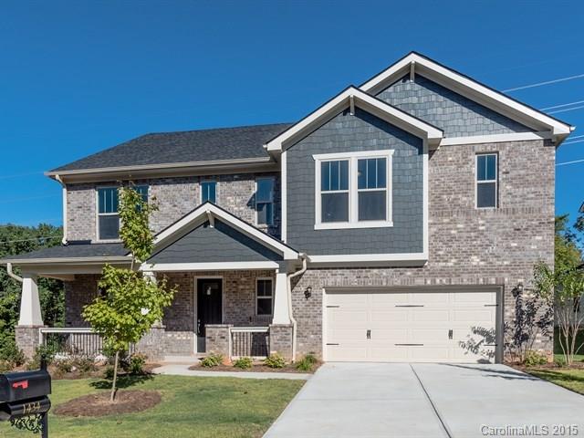 1434 Cilantro Court, Unit 285 Tega Cay, SC 29708 - Photo 1 of 24 a front view of a house with yard