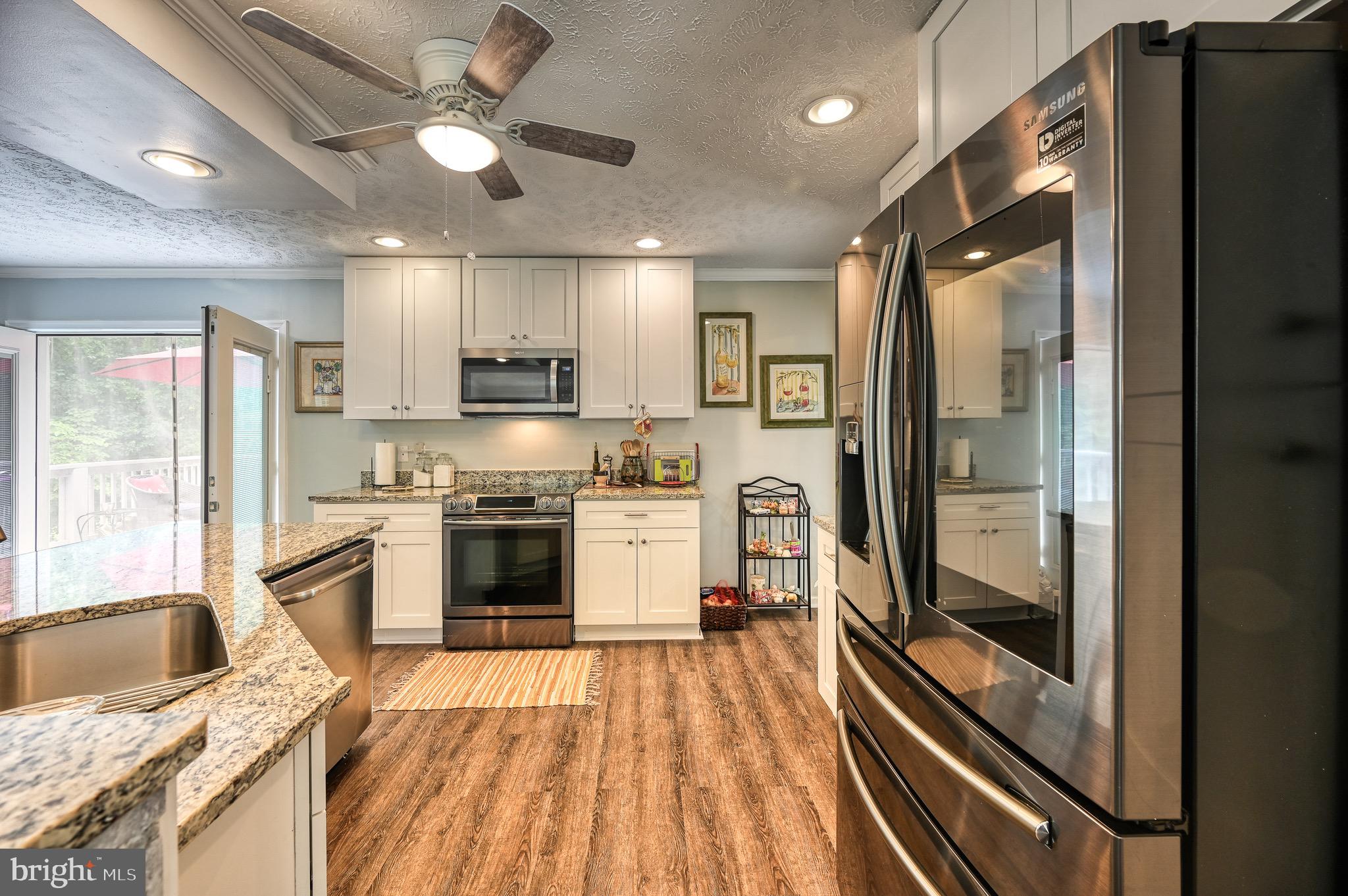 104 Privacy Road Bumpass, VA 23024 - Photo 11 of 81 New Cabinets, appliances and granite counters