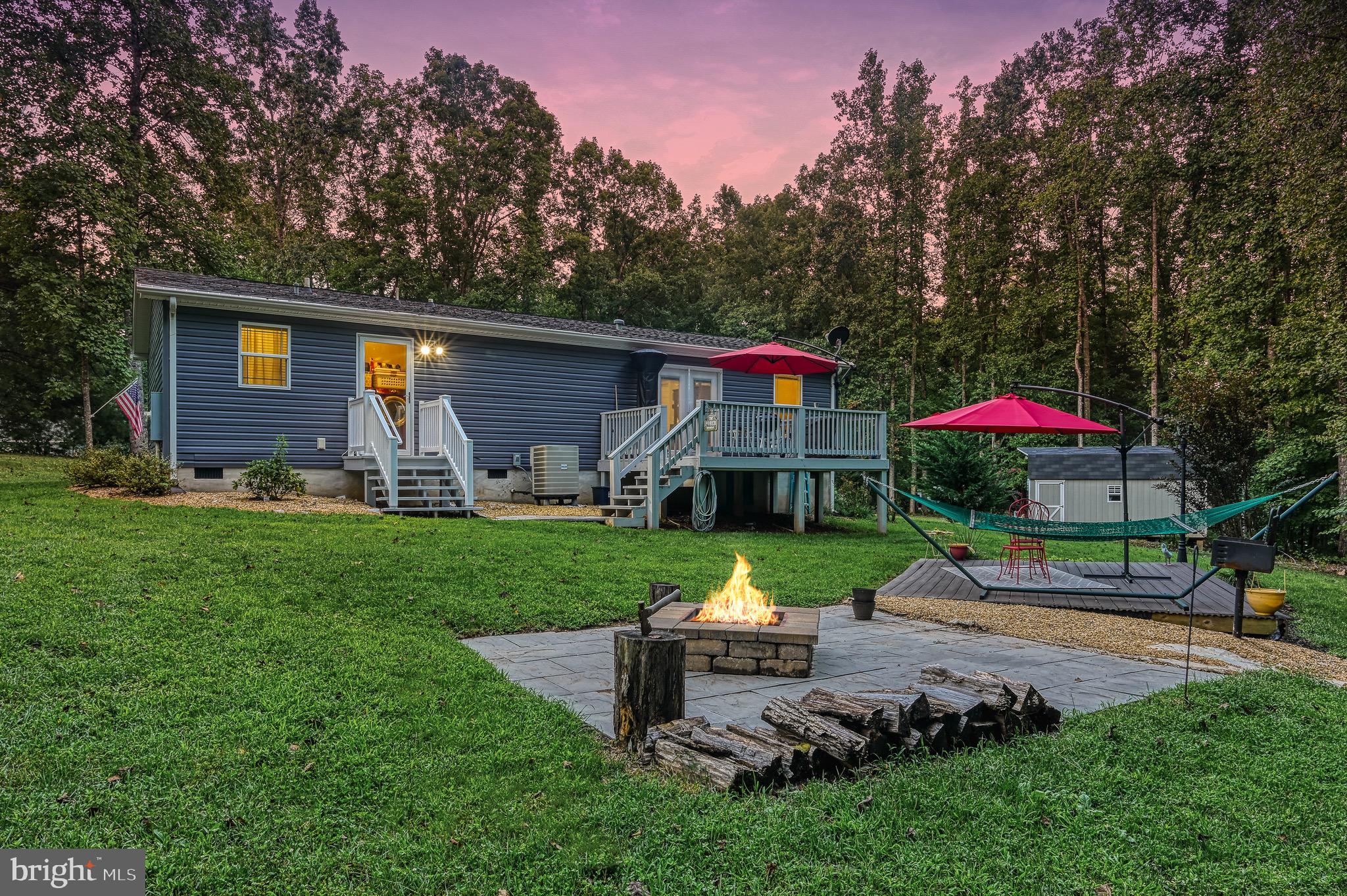104 Privacy Road Bumpass, VA 23024 - Photo 4 of 81 Fire Pit and Lower Level Patio for entertaining