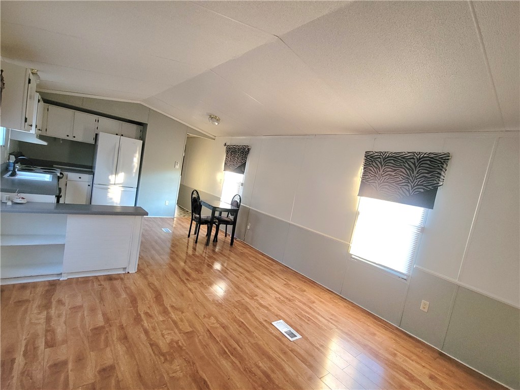 517 Dalton Road Piedmont, SC 29673 - Photo 12 of 12 Bright and inviting open floorplan with durable flooring and functional kitchen space.