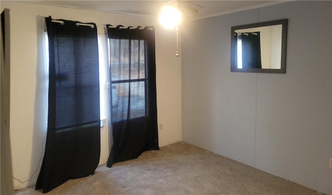 517 Dalton Road Piedmont, SC 29673 - Photo 8 of 12 Bright and airy room with inviting features.