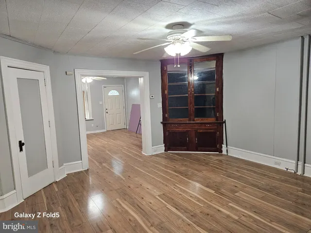 a view of a livingroom with a furniture