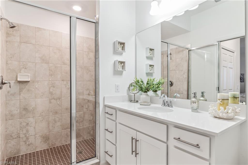 43060 Greenway Boulevard, Unit 742 Babcock Ranch, FL 33982 - Photo 12 of 12 a bathroom with a sink and a mirror