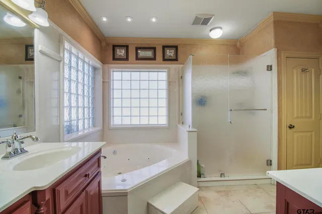 a living room with furniture a fireplace and a table