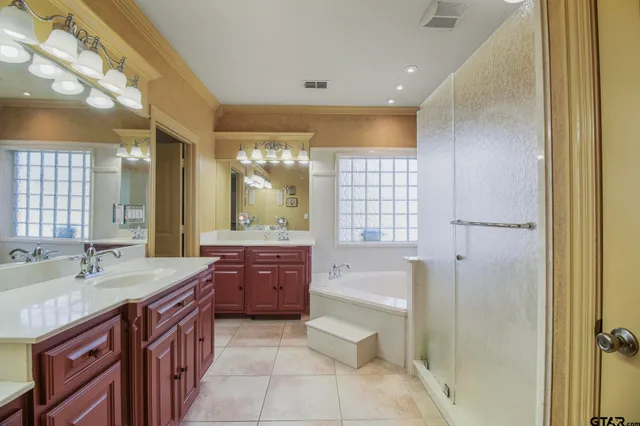 a view of a swimming pool with a yard