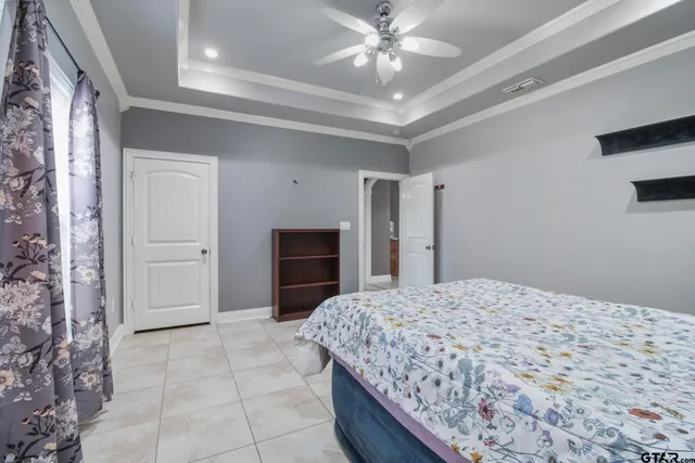 a view of a house with backyard and porch