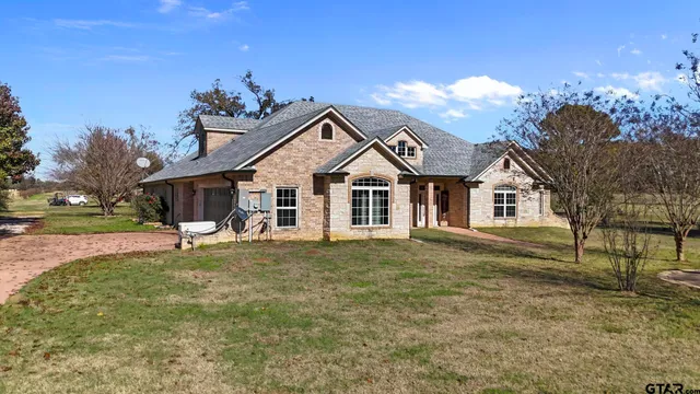 a kitchen with stainless steel appliances granite countertop a stove and a sink
