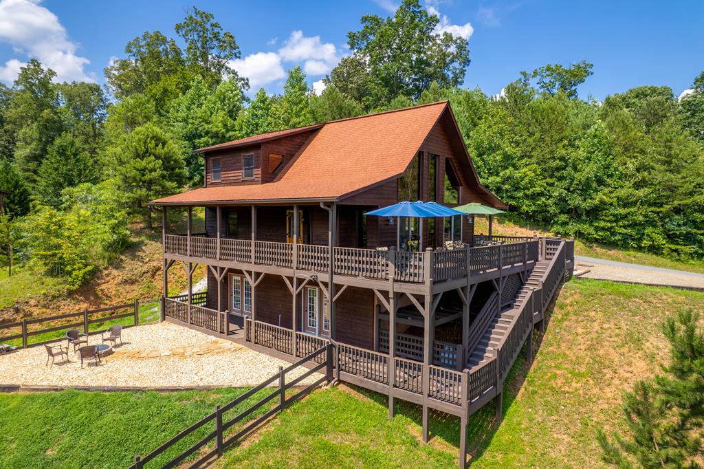 730 Dillon Oaks Drive Murphy, NC 28906 - Photo 1 of 38 an aerial view of a house with swimming pool garden and patio