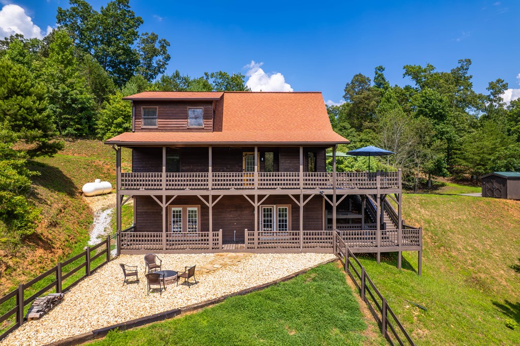 730 Dillon Oaks Drive Murphy, NC 28906 - Photo 3 of 38 an aerial view of a house with swimming pool garden and patio