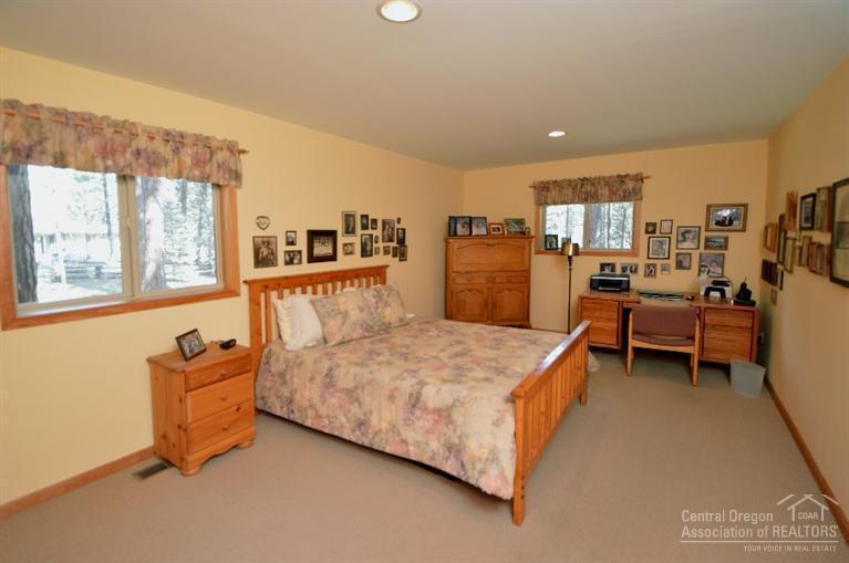 69762 Camp Polk Road Sisters, OR 97759 - Photo 21 of 24 Ground level spacious master with office