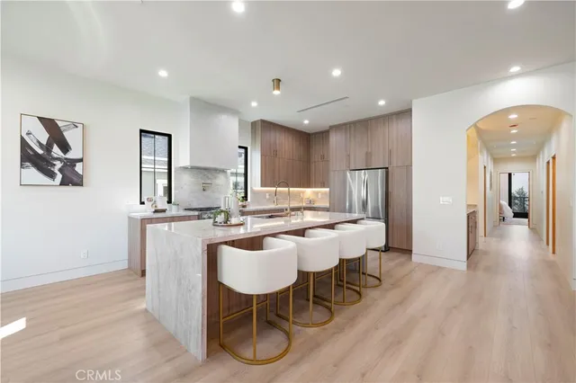 a living room with a bed furniture and a window